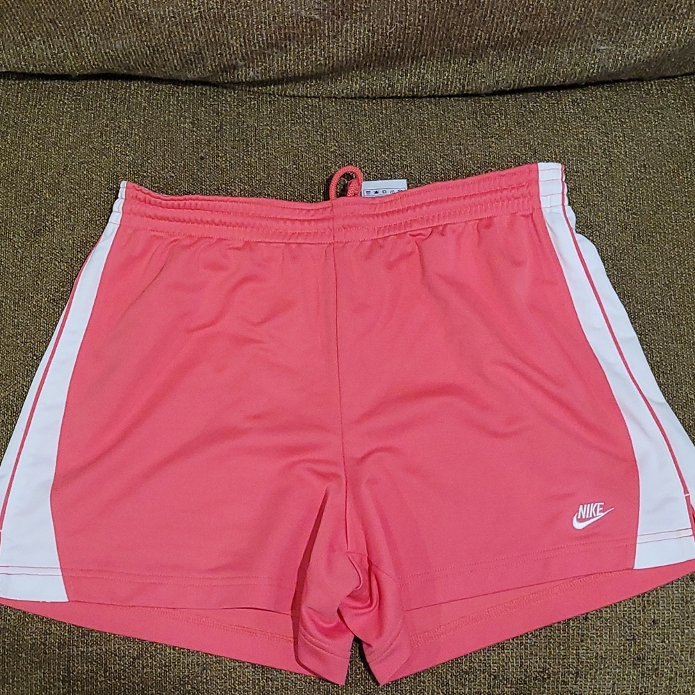 Nike pink w/white trim running shorts sz L